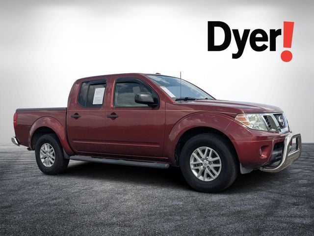 2015 Nissan Frontier SV in Cayenne Red Pearl — front three-quarter view