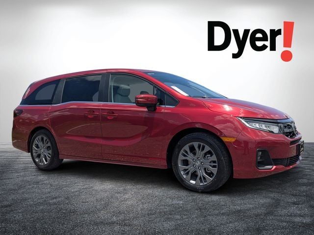 2025 Honda Odyssey Touring in Radiant Red Metallic II — front three-quarter view