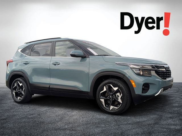 2025 Kia Seltos EX in Pluton Blue — front three-quarter view