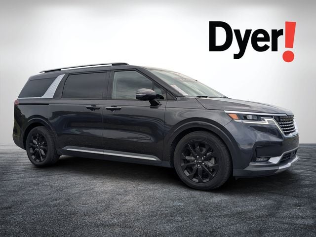 2022 Kia Carnival SX in Pantera Metal — front three-quarter view