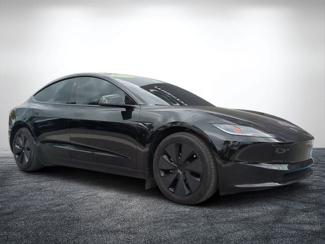2024 Tesla Model 3 Base in Solid Black — front three-quarter view